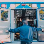 man opening ambulance door